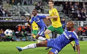 epa02337892 Patrik Mraz (C) of MSK Zilina vies for the ball with Gael Kakuta (L) and Nicolas Anelka of Chelsea FC during their UEFA Champions League group F soccer match between MSK Zilina and Chelsea FC in Zilina, Slovakia, 15 September 2010. Chelsea won 4-1.  EPA/PETER HUDEC