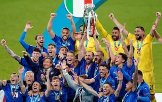 Italy Captain Giorgio Chiellini lifts the UEFA Euro 2020 Trophy following his sides victory over England in the UEFA Euro2020 Final at Wembley Stadium, London. Picture date: Sunday July 11, 2021.