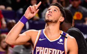 PHOENIX, AZ - FEBRUARY 29: Devin Booker #1 of the Phoenix Suns takes the floor during the game against the Golden State Warriors on February 29, 2020 at Talking Stick Resort Arena in Phoenix, Arizona. NOTE TO USER: User expressly acknowledges and agrees that, by downloading and or using this photograph, user is consenting to the terms and conditions of the Getty Images License Agreement. Mandatory Copyright Notice: Copyright 2020 NBAE (Photo by Barry Gossage/NBAE via Getty Images)