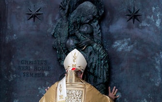 Cardinal Vicar of Rome Baldassarre Reina opens the Holy Door for the Catholic Holy Year of the Jubilee 2025, in the Basilica of St. John Lateran, in Rome,, 29 December 2024. ANSA/ANGELO CARCONI/POOL