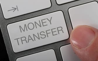 A man making an online money transfer.
