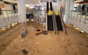 Flood water covers the floor of a shopping mall in Hong Kong on September 8, 2023. Record rainfall in Hong Kong caused widespread flooding in the early hours on September 8, disrupting road and rail traffic just days after the city dodged major damage from a super typhoon. (Photo by Bertha WANG / AFP) (Photo by BERTHA WANG/AFP via Getty Images)