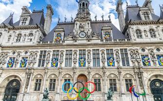 Facade of the Hotel de Ville, the city hall of Paris, with the Paris 2024 Olympic rings installed at the front in France
