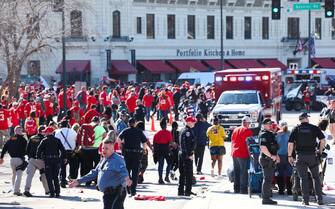 KANSAS CITY, MISSOURI - FEBRUARY 14: Law enforcement and medical personnel respond to a shooting at Union Station during the Kansas City Chiefs Super Bowl LVIII victory parade on February 14, 2024 in Kansas City, Missouri. Several people were shot and two people were detained after a rally celebrating the Chiefs Super Bowl victory.   Jamie Squire/Getty Images/AFP (Photo by JAMIE SQUIRE / GETTY IMAGES NORTH AMERICA / Getty Images via AFP)