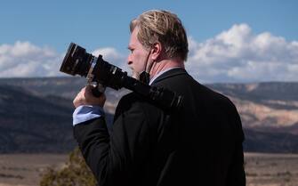 Writer, director, and producer Christopher Nolan on the set of OPPENHEIMER.