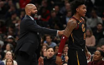 WASHINGTON, DC - FEBRUARY 21: Head coach J.B. Bickerstaff of the Cleveland Cavaliers walks Kevin Porter Jr. #4 of the Cleveland Cavaliers off of the court after Porter Jr. was disqualified from the contest after two technical fouls against the Washington Wizards during the second half at Capital One Arena on February 21, 2020 in Washington, DC. (Photo by Patrick Smith/Getty Images)