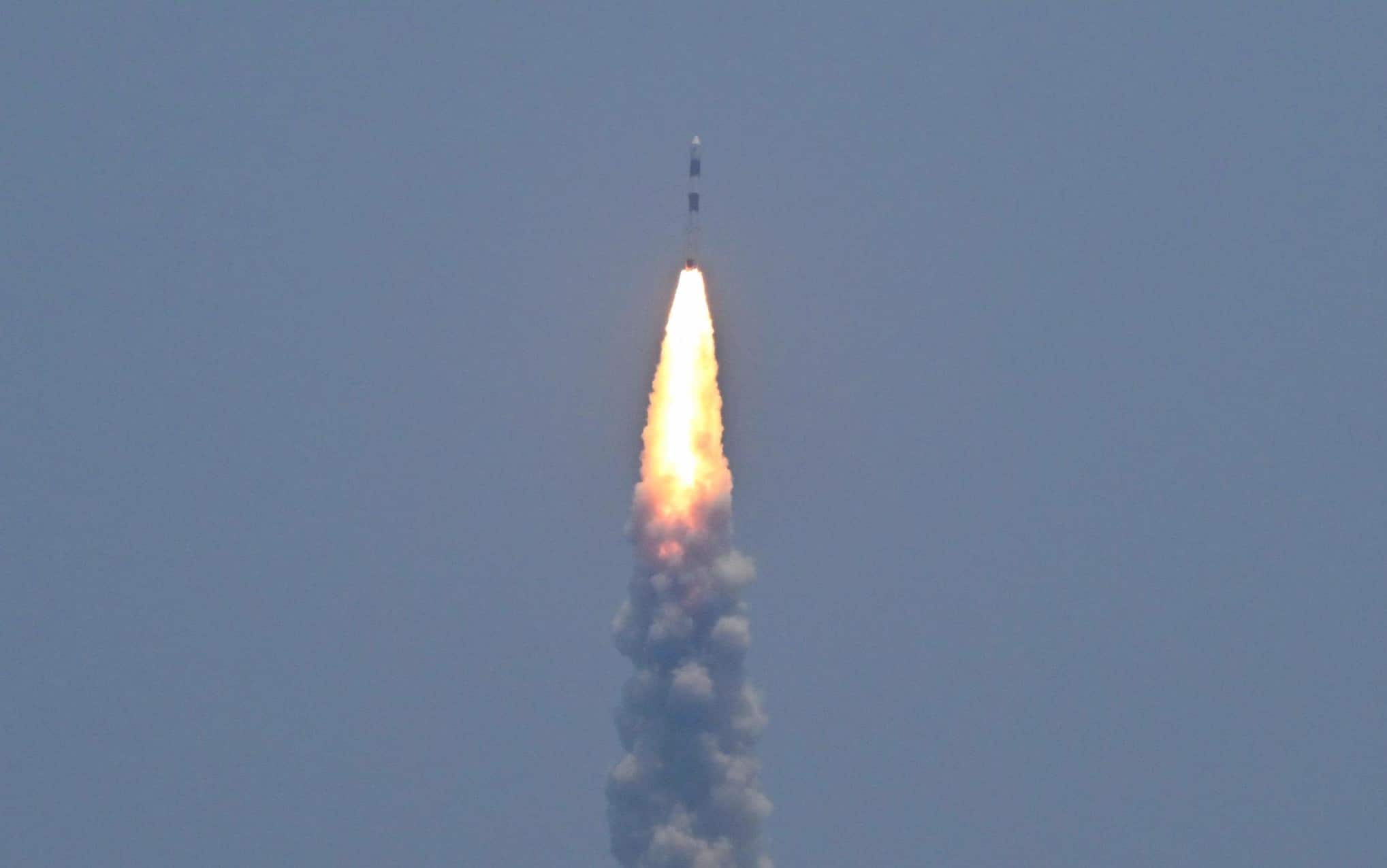 PSLV XL rocket carrying the Aditya-L1 spacecraft, the first space-based Indian observatory to study the Sun, is launched from the Satish Dhawan Space Centre in Sriharikota on September 02, 2023. The latest mission in India's ambitious space programme blasted off September 2, on a voyage to the centre of the solar system, a week after the country's successful unmanned Moon landing. Aditya-L1 is carrying scientific instruments to observe the Sun's outermost layers, launching shortly before midday to begin its four-month journey. (Photo by R. Satish BABU / AFP)