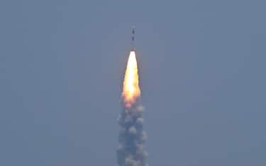 PSLV XL rocket carrying the Aditya-L1 spacecraft, the first space-based Indian observatory to study the Sun, is launched from the Satish Dhawan Space Centre in Sriharikota on September 02, 2023. The latest mission in India's ambitious space programme blasted off September 2, on a voyage to the centre of the solar system, a week after the country's successful unmanned Moon landing. Aditya-L1 is carrying scientific instruments to observe the Sun's outermost layers, launching shortly before midday to begin its four-month journey. (Photo by R. Satish BABU / AFP)