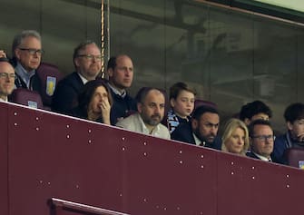 BIRMINGHAM, ENGLAND - APRIL 11: Prince William, Prince of Wales and Prince George of Wales watch from the stands during the UEFA Europa Conference League 2023/24 Quarter-final first leg match between Aston Villa and Lille OSC at Villa Park on April 11, 2024 in Birmingham, England. (Photo by Catherine Ivill - AMA/Getty Images)