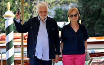 Italian musician Nicola Piovani (L) and  Italian director Cristina Comencini arrive at the Lido Beach for the Venice International Film Festival, in Venice, Italy, 31 August 2024. The 81st edition of the Venice Film Festival runs from 28 August to 07 September 2024.   ANSA/ETTORE FERRARI 





