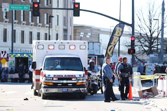 KANSAS CITY, MISSOURI - FEBRUARY 14: Law enforcement and medical personnel respond to a shooting at Union Station during the Kansas City Chiefs Super Bowl LVIII victory parade on February 14, 2024 in Kansas City, Missouri. Several people were shot and two people were detained after a rally celebrating the Chiefs Super Bowl victory.   Jamie Squire/Getty Images/AFP (Photo by JAMIE SQUIRE / GETTY IMAGES NORTH AMERICA / Getty Images via AFP)