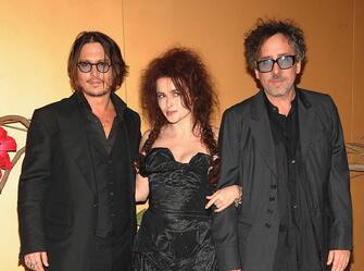 NEW YORK - NOVEMBER 17:  (L-R) Actor Johnny Depp, actress Helena Bonham Carter and director Tim Burton attend a Tribute to Tim Burton at The Museum of Modern Art on November 17, 2009 in New York City.  (Photo by Jamie McCarthy/WireImage)
