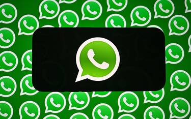 ANKARA, TURKIYE - AUGUST 27: In this photo illustration, WhatsApp logos are being displayed on both a mobile phone and a laptop screen in Ankara, Turkiye on August 27, 2024. (Photo by Ismail Aslandag/Anadolu via Getty Images)