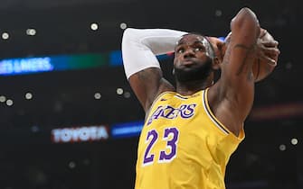 LOS ANGELES, CA - MARCH 09: Jayson Tatum #0 of the Boston Celtics looks as LeBron James #23 of the Los Angeles Lakers goes up for a dunk in the first half at Staples Center on March 9, 2019 in Los Angeles, California. NOTE TO USER: User expressly acknowledges and agrees that, by downloading and or using this photograph, User is consenting to the terms and conditions of the Getty Images License Agreement. (Photo by John McCoy/Getty Images)