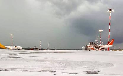 Maltempo a Milano, temporali e grandine a Malpensa. FOTO