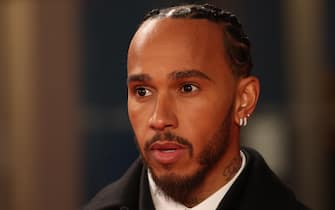 epa11905994 British driver Lewis Hamilton of Ferrari arrives ahead of the Formula One season launch event to mark the start of the sport s 75th anniversary year at the O2 Arena in London, Britain, 18 February 2025.  EPA/NEIL HALL