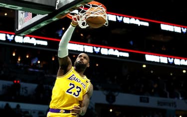 CHARLOTTE, NORTH CAROLINA - FEBRUARY 05: LeBron James #23 of the Los Angeles Lakers dunks the ball during the first half of a game against the Charlotte Hornets at Spectrum Center on February 05, 2024 in Charlotte, North Carolina. NOTE TO USER: User expressly acknowledges and agrees that, by downloading and or using this photograph, User is consenting to the terms and conditions of the Getty Images License Agreement. (Photo by David Jensen/Getty Images)