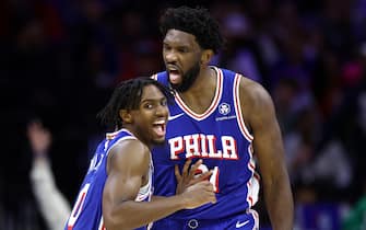 PHILADELPHIA, PENNSYLVANIA - NOVEMBER 08: Joel Embiid #21 and Tyrese Maxey #0 of the Philadelphia 76ers react during the fourth quarter against the Boston Celtics at the Wells Fargo Center on November 08, 2023 in Philadelphia, Pennsylvania. NOTE TO USER: User expressly acknowledges and agrees that, by downloading and or using this photograph, User is consenting to the terms and conditions of the Getty Images License Agreement. (Photo by Tim Nwachukwu/Getty Images)