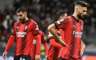 AC Milan s forward Olivier Giroud (R) reacts during the Uefa Champions League group F stage soccer match between AC MIlan and Borussia Dortmund at the Giuseppe Meazza stadium in MIlan, Italy, 28 Novembre 2023. ANSA/DANIEL DAL ZENNARO 