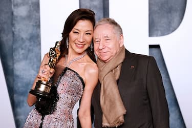 Malaysian actress Michelle Yeoh (L) and French motor racing executive Jean Todt (R) attend the Vanity Fair 95th Oscars Party at the The Wallis Annenberg Center for the Performing Arts in Beverly Hills, California on March 12, 2023. (Photo by Michael TRAN / AFP) (Photo by MICHAEL TRAN/AFP via Getty Images)