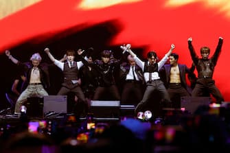 INDIO, CALIFORNIA - APRIL 19: (FOR EDITORIAL USE ONLY) (L-R) Song Min-gi, Jeong Yun-ho, Seonghwa, Choi Jong-ho, Kim Hong Joong, Wooyoung, San, and Kang Yeo-sang of ATEEZ perform at the Sahara Tent during the 2024 Coachella Valley Music and Arts Festival at Empire Polo Club on April 19, 2024 in Indio, California. (Photo by Frazer Harrison/Getty Images for Coachella)