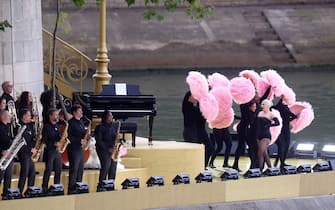 PARIS, FRANCE - JULY 26:  American Singer-Songwriter Lady Gaga performs at Square Barye during the athletesâ   parade on the River Seine during the opening ceremony of the Olympic Games Paris 2024 on July 26, 2024 in Paris, France. (Photo by Lars Baron/Getty Images)