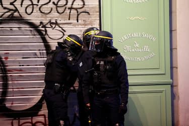 (FILE)
Riot police during clashes following a demonstration in memory of 17-year-old Nahel who was killed by French Police in Marseille, France, 30 June 2023. ANSA/SEBASTIEN NOGIER