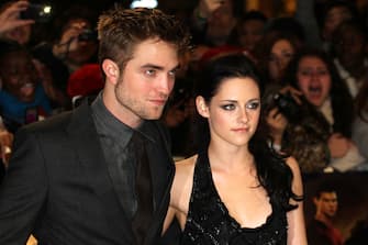 LONDON, UNITED KINGDOM - NOVEMBER 16: Robert Pattison and Kristen Stewart attend the UK premiere of The Twilight Saga: Breaking Dawn Part 1 at Westfield Stratford City on November 16, 2011 in London, England. (Photo by Fred Duval/FilmMagic)