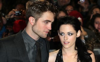 LONDON, UNITED KINGDOM - NOVEMBER 16: Robert Pattison and Kristen Stewart attend the UK premiere of The Twilight Saga: Breaking Dawn Part 1 at Westfield Stratford City on November 16, 2011 in London, England. (Photo by Fred Duval/FilmMagic)