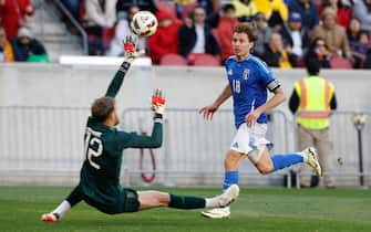 epa11241816 Nicolo Barella of Italy scores the 2-0 goal during the international friendly soccer match between Italy and Ecuador, in Harrison, New Jersey, USA, 24 March 2024.  EPA/KENA BETANCUR