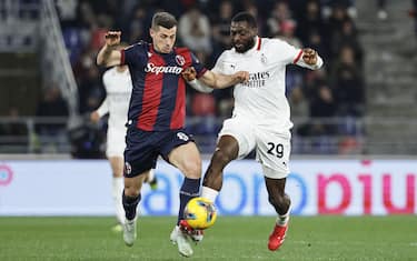 Bologna's Remo Freuler (L) and Milan's  Youssouf Fofana (R)  in action during the Italian Serie A soccer match Bologna FC vs AC Milan at Renato Dall'Ara stadium in Bologna, Italy, 27 February 2025. ANSA /ELISABETTA BARACCHI

