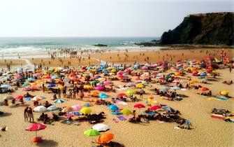 Crowded beach in the full strength of the Summer.