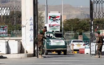 epa11075833 Houthi fighters ride vehicles decorated in green cover carrying the coffins of their slain comrades who were killed in recent US-UK-carried out airstrikes on Houthi sites, during a funeral at the Shaab mosque in Sana'a, Yemen, 14 January 2024. At least six Houthi fighters were killed and five others wounded in airstrikes carried out on 12 January 2024 by the US and Britain against several Houthis-controlled sites in Yemen in response to recent Houthis attacks on shipping lanes in the Red Sea, according to the Houthis military spokesman Yahya Sarea. The US Department of Defense had announced in December 2023 a multinational operation to safeguard trade and to protect ships in the Red Sea amid the recent escalation in Houthi attacks. Houthis vowed to attack Israeli-bound ships and prevent them from navigating in the Red Sea and the Bab al-Mandab Strait in retaliation for Israel's airstrikes on the Gaza Strip, according to Sarea.  EPA/YAHYA ARHAB