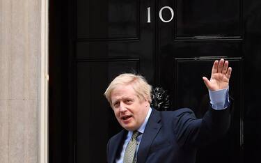 TOPSHOT - Britain's Prime Minister and Conservative Party leader Boris Johnson arrives at 10 Downing Street in central London on December 13, 2019, following an audience with Britain's Queen Elizabeth II at Buckingham Palace, where she invited him to become Prime Minister and form a new government. - Conservative Prime Minister Boris Johnson on Friday hailed a political "earthquake" in Britain after a thumping election victory which clears the way for the country to finally leave the EU next month after years of paralysing deadlock. (Photo by Ben STANSALL / AFP) (Photo by BEN STANSALL/AFP via Getty Images)