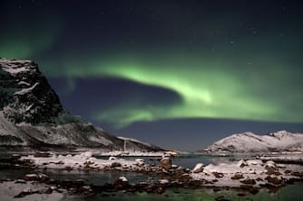 Clear winter skies in Northern Norway enabled clearly viewing the Aurora Borealis, also known as The Northern Lights, near the city of Tromso, located by the Norwegian Sea, on March 07 2017. Aurora Borealis is a natural light display in the sky, predominantly seen in the high latitude (Arctic and Antarctic) regions.  (Photo by Gili Yaari/NurPhoto via Getty Images)