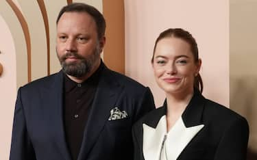 (L-R) Yorgos Lanthimos and Emma Stone at the 96th Oscars Nominees Luncheon held at the Beverly Hilton Hotel International Ballroom in Beverly Hills, CA on Monday, ​February 12, 2024. (Photo By Sthanlee B. Mirador/Sipa USA)