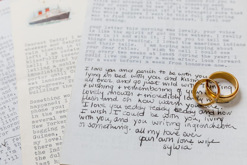 Letters_to_Ted_Hughes_from_Sylvia_Plath_photographed_with_wedding_rings._Courtesy_Sotheby_s.jpg