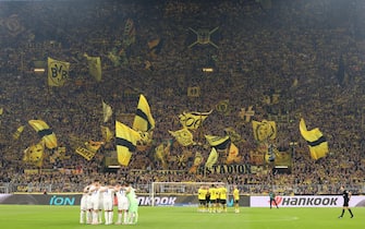 epa10834492 Dortmund fans cheer before the German Bundesliga soccer match between Borussia Dortmund and 1. FC Heidenheim in Dortmund, Germany, 01 September 2023.  EPA/Christopher Neundorf CONDITIONS - ATTENTION: The DFL regulations prohibit any use of photographs as image sequences and/or quasi-video.