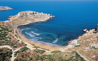 MALTA - MAY 27: Ghajn Tuffieha bay with the remains of the Roman baths, Malta. (Photo by DeAgostini/Getty Images)