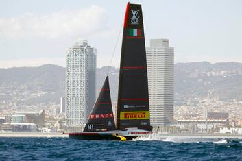epa11626037 Team Luna Rossa Prada Pirelli competes during Day 1 of the 2024 Louis Vuitton Cup final in Barcelona, Spain, 26 September 2024. The winner of the Louis Vuitton Cup sailing competition determines the challenger in the 37th America's Cup to be held in October.  EPA/Quique Garcia