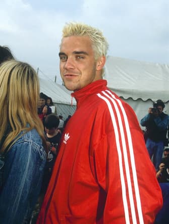Glastonbury Festival, Britain - 1995, Robbie Williams - Take That (Photo by Brian Rasic/Getty Images)