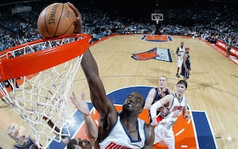 CHARLOTTE, NC - MARCH 28:   Emeka Okafor #50 of the Charlotte Bobcats dunks the ball during the game against the New Jersey Nets  March 28, 2005 at the Charlotte Coliseum in Charlotte, North Carolina. The Nets defeated the Bobcats 95-91.  NOTE TO USER: User expressly acknowledges and agrees that, by downloading and/or using this Photograph, user is consenting to the terms and conditions of the Getty Images License Agreement.  (Photo by Streeter Lecka/Getty Images)