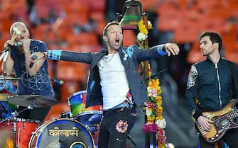 Coldplay performs during Super Bowl 50 between the Carolina Panthers and the Denver Broncos at Levi's Stadium in Santa Clara, California February 7, 2016. / AFP / TIMOTHY A. CLARY        (Photo credit should read TIMOTHY A. CLARY/AFP via Getty Images)