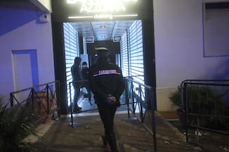 A Carabiniere officer enters the nightclub 'Lanterna Azzurra' in Corinaldo, near Ancona, central Italy, 08 December 2018. A stampede that occurred overnight outside the nightclub killed six people and injured more than 100, after someone probably caused a panic with a stinging spray. The incident took place at the packed club hosting a concert by popular Italian rapper Sfera Ebbasta. ANSA/ STRINGER