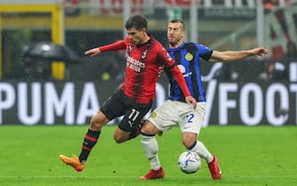 Christian Pulisic of AC Milan and Henrikh Mkhitaryan of FC Internazionale seen in action during Serie A 2023/24 football match between AC Milan and FC Internazionale at San Siro Stadium, Milan, Italy on April 22, 2024