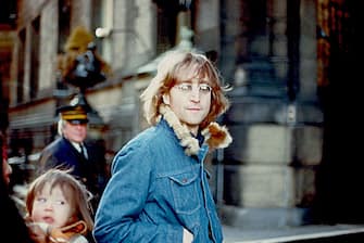 NEW YORK - 1977: Former Beatle John Lennon poses for a photo with his wife Yoko Ono and son Sean Lennon in 1977 in New York City, New York. (Photo by Vinnie Zuffante/Michael Ochs Archives/Getty Images) 