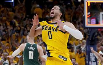 INDIANAPOLIS, INDIANA - APRIL 26: Tyrese Haliburton #0 of the Indiana Pacers celebrates after beating the Milwaukee Bucks 121-119 in overtime during game three of the Eastern Conference First Round Playoffs at Gainbridge Fieldhouse on April 26, 2024 in Indianapolis, Indiana. NOTE TO USER: User expressly acknowledges and agrees that, by downloading and or using this photograph, User is consenting to the terms and conditions of the Getty Images License Agreement. (Photo by Dylan Buell/Getty Images)