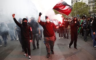 epa11591333 People attend a protest rally in Paris, France, 07 September 2024 as the French left parties called for rallies against President Macron's politics. Protests are taking place across France over the appointment of Michel Barnier as the new French prime minister, after the election that resulted in a National Assembly without a majority and in which the left won the largest number of seats.  EPA/YOAN VALAT