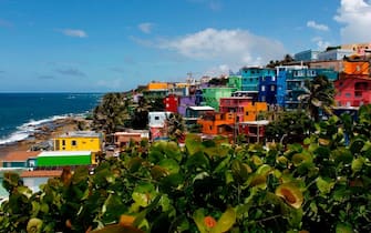 A view of the neighbourhood of La Perla where the video "Despacito" was recorded in San Juan, on July 22, 2017.
Something unusual is happening in La Perla, a poor barrio clinging to a steep hillside between Old San Juan and the sea where the video for the pop hit "Despacito" was filmed. / AFP PHOTO / Ricardo ARDUENGO        (Photo credit should read RICARDO ARDUENGO/AFP via Getty Images)
