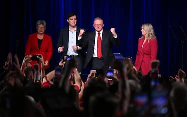 epa12070973 Australian Prime Minister Anthony Albanese (2-R) celebrates Labor's Federal election victory with his partner Jodie Haydon (R), son Nathan (2-L) and Australian Foreign Minister Penny Wong (L) during a reception at Canterbury-Hurlstone Park RSL Club in Hurlstone Park, Sydney, Australia, 03 May 2025.  EPA/DEAN LEWINS AUSTRALIA AND NEW ZEALAND OUT